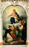 foto R.Pellizzon Otus L'altare della Madonna del Rosario  sulla parete della navata sinistra. L'altare era nella chiesa di S. Giorgio (ora demolita) ed era dedicato a S. Francesco. Fu donato alla chiesa da Diodato Bembo nel 1779 Nel 1860 la pala di Sante Peranda, ora nel lato sinistro del coro, fu sostituita dall'attuale di Giuseppe De Lorenzi Nel dipinto  rappresenta la Madonna del Rosario con in basso S. Benedetto, S. Rosa, S. Lucia e un quarto santo non identificato Nelle due nicchie ai lati dell'altare realizzate nella prima met del '900 vi sono le statue recenti della madonna del Rosario e di S. Caterina